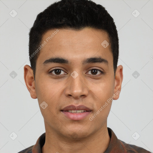 Joyful latino young-adult male with short  black hair and brown eyes