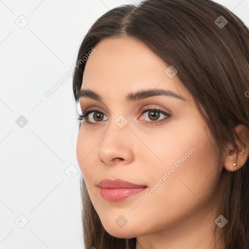 Neutral white young-adult female with long  brown hair and brown eyes