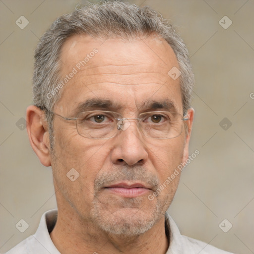 Neutral white middle-aged male with short  gray hair and brown eyes