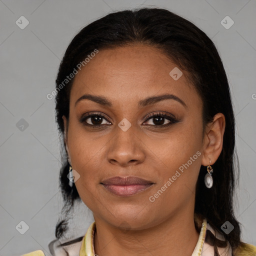 Joyful black young-adult female with medium  brown hair and brown eyes