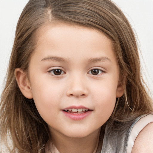 Joyful white child female with long  brown hair and brown eyes