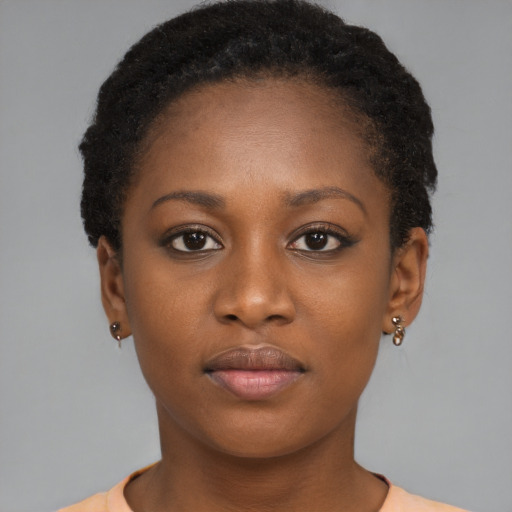 Neutral black young-adult female with short  brown hair and brown eyes