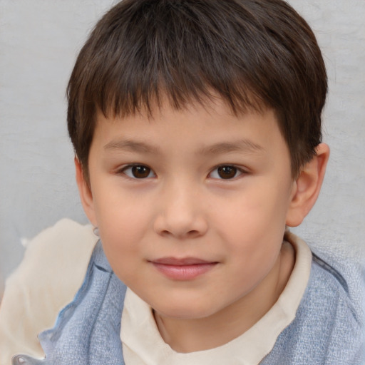 Joyful white child female with short  brown hair and brown eyes