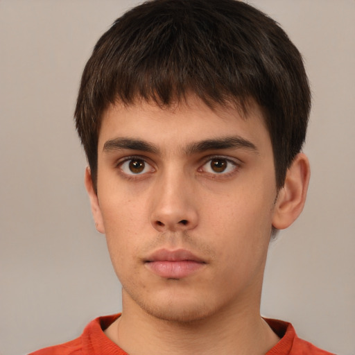 Neutral white young-adult male with short  brown hair and brown eyes