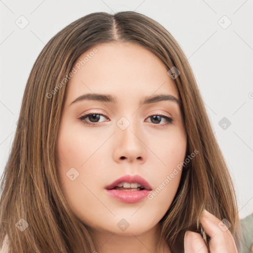 Neutral white young-adult female with long  brown hair and brown eyes