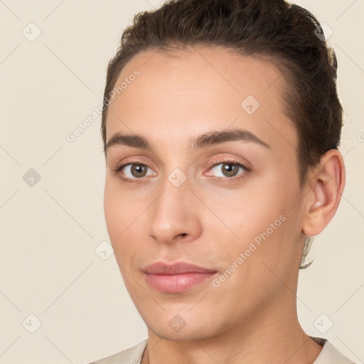 Joyful white young-adult female with short  brown hair and brown eyes