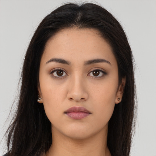 Neutral asian young-adult female with long  brown hair and brown eyes