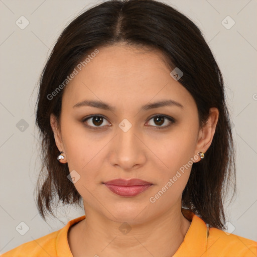 Joyful latino young-adult female with medium  brown hair and brown eyes