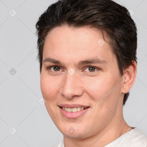 Joyful white young-adult female with short  brown hair and brown eyes