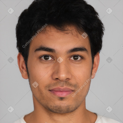 Neutral latino young-adult male with short  black hair and brown eyes