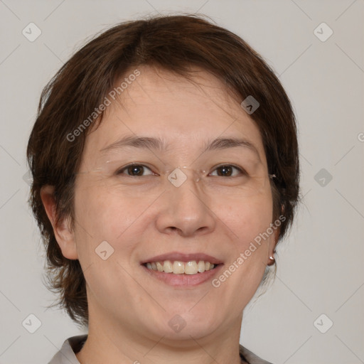 Joyful white adult female with medium  brown hair and brown eyes