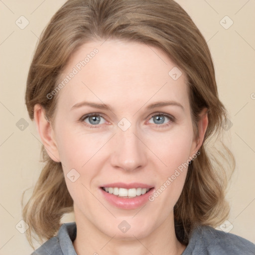 Joyful white young-adult female with medium  brown hair and blue eyes