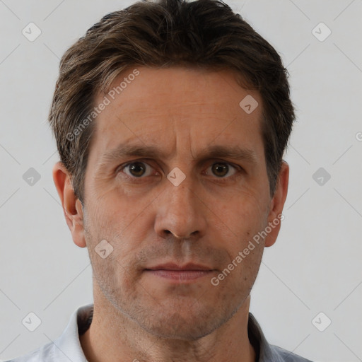 Neutral white adult male with short  brown hair and brown eyes