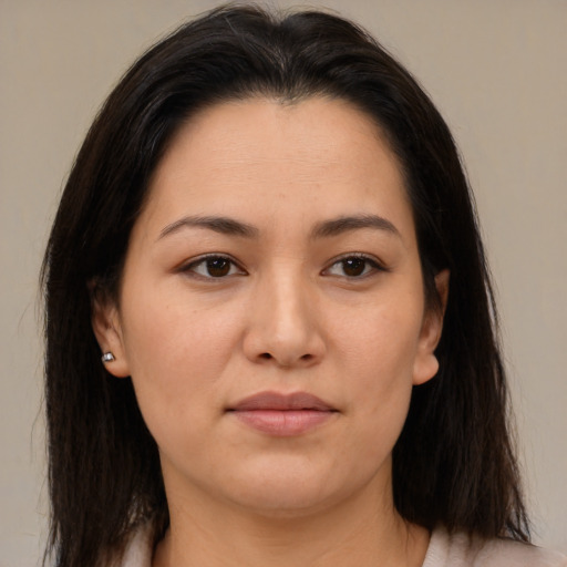 Joyful asian young-adult female with medium  brown hair and brown eyes