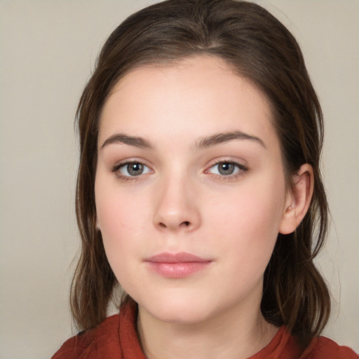 Neutral white young-adult female with medium  brown hair and brown eyes