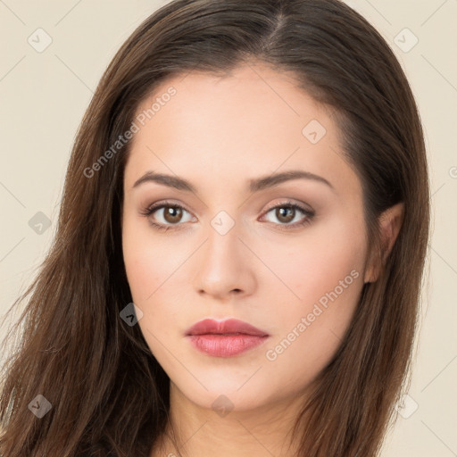 Neutral white young-adult female with long  brown hair and brown eyes