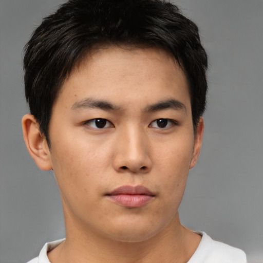 Neutral asian young-adult male with short  brown hair and brown eyes