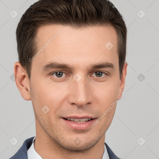 Joyful white young-adult male with short  brown hair and grey eyes