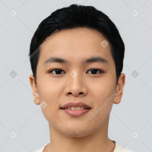 Joyful asian young-adult male with short  black hair and brown eyes