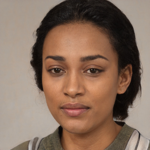 Neutral latino young-adult female with medium  black hair and brown eyes
