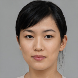 Neutral asian young-adult female with medium  black hair and brown eyes