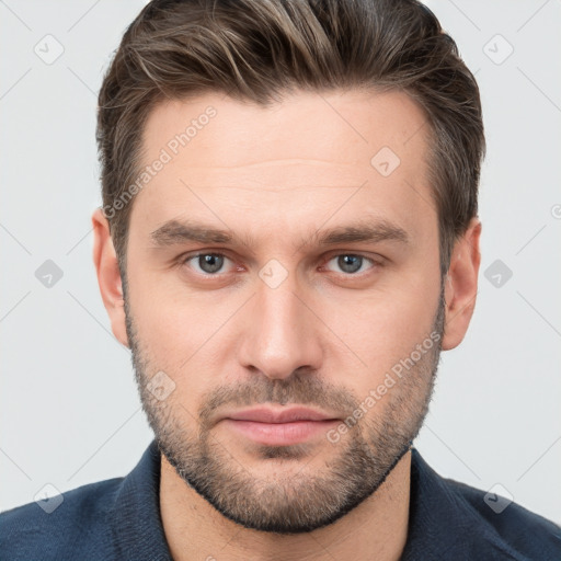 Neutral white young-adult male with short  brown hair and brown eyes