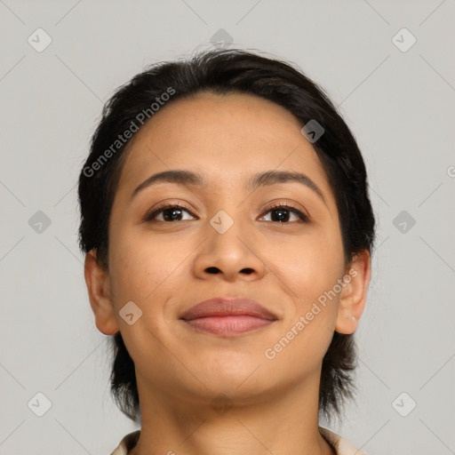 Joyful latino young-adult female with medium  brown hair and brown eyes