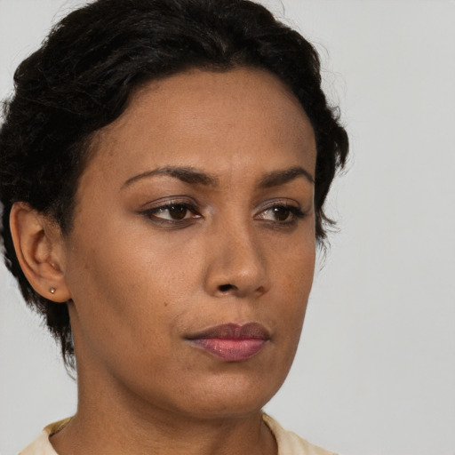 Neutral latino young-adult female with short  brown hair and brown eyes