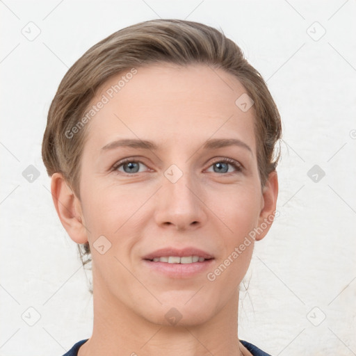 Joyful white young-adult female with short  brown hair and grey eyes