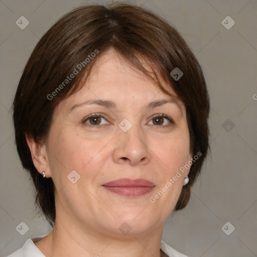 Joyful white adult female with medium  brown hair and brown eyes