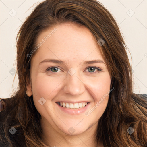 Joyful white young-adult female with long  brown hair and green eyes