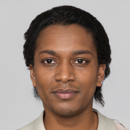 Neutral black young-adult female with short  black hair and brown eyes