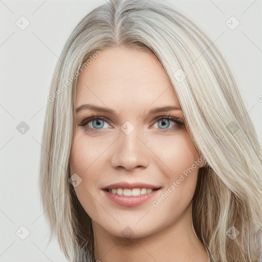 Joyful white young-adult female with long  brown hair and blue eyes