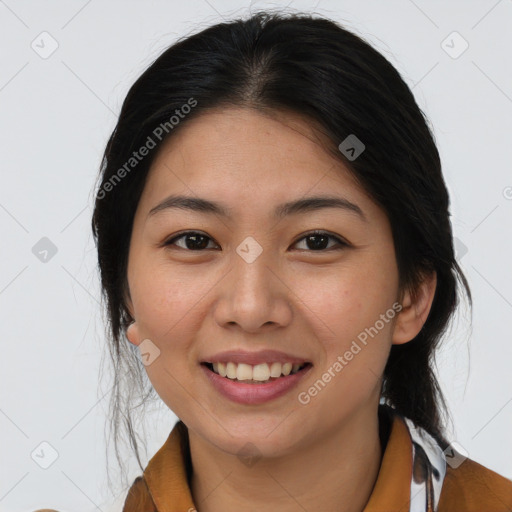 Joyful asian young-adult female with medium  black hair and brown eyes