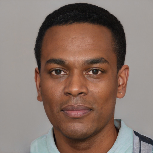 Neutral black young-adult male with short  black hair and brown eyes