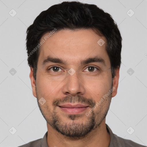 Joyful white young-adult male with short  black hair and brown eyes