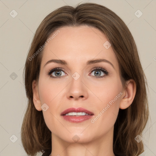 Joyful white young-adult female with medium  brown hair and green eyes