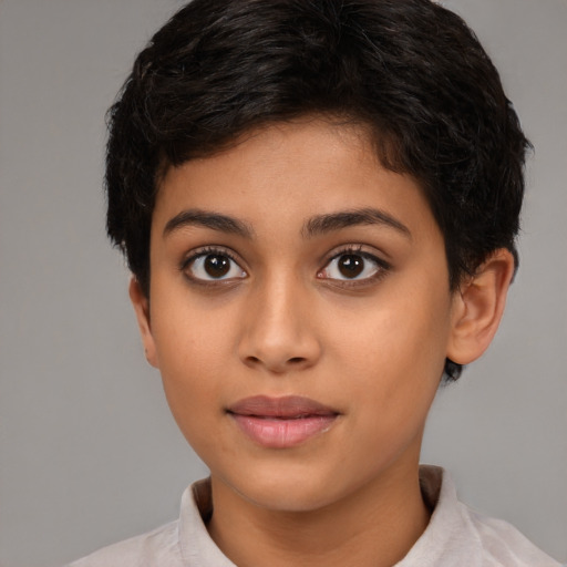 Joyful latino young-adult female with short  brown hair and brown eyes