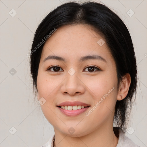 Joyful white young-adult female with medium  brown hair and brown eyes