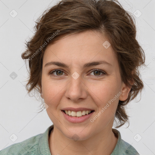 Joyful white young-adult female with medium  brown hair and green eyes