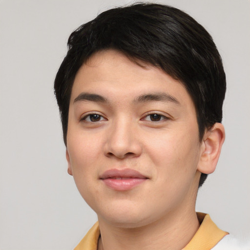 Joyful asian young-adult male with short  brown hair and brown eyes