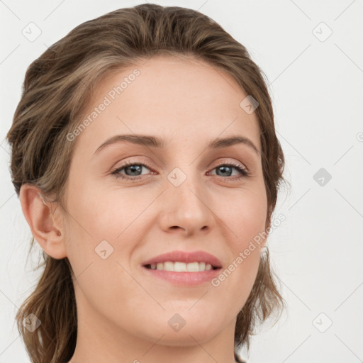 Joyful white young-adult female with medium  brown hair and green eyes