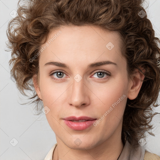 Joyful white young-adult female with medium  brown hair and green eyes