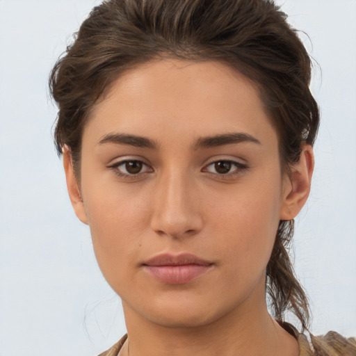 Neutral white young-adult female with short  brown hair and brown eyes