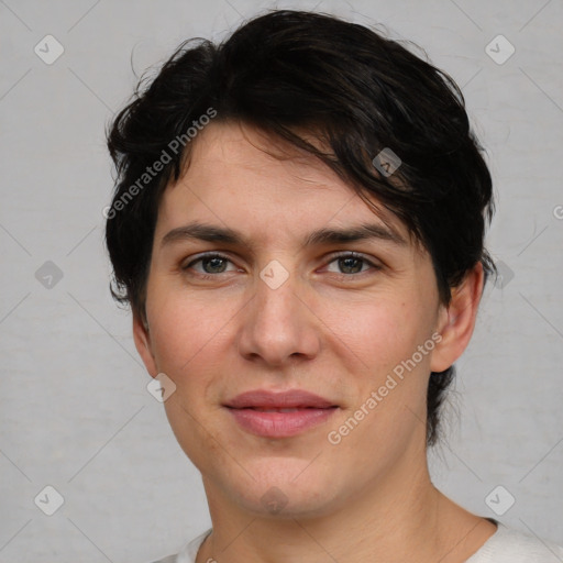 Joyful white young-adult male with medium  brown hair and brown eyes