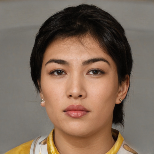 Neutral asian young-adult female with short  brown hair and brown eyes