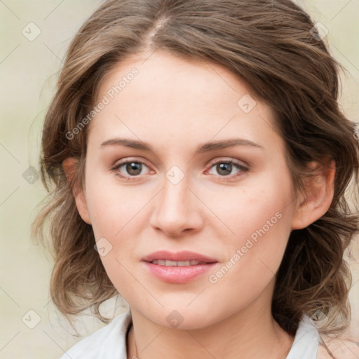 Joyful white young-adult female with medium  brown hair and green eyes