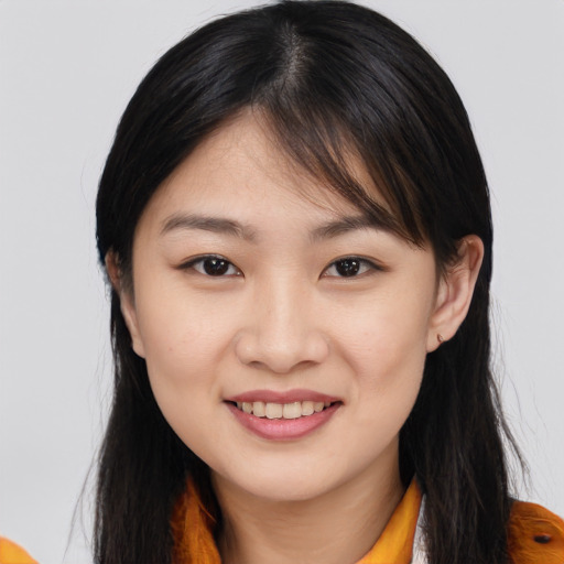 Joyful asian young-adult female with medium  brown hair and brown eyes