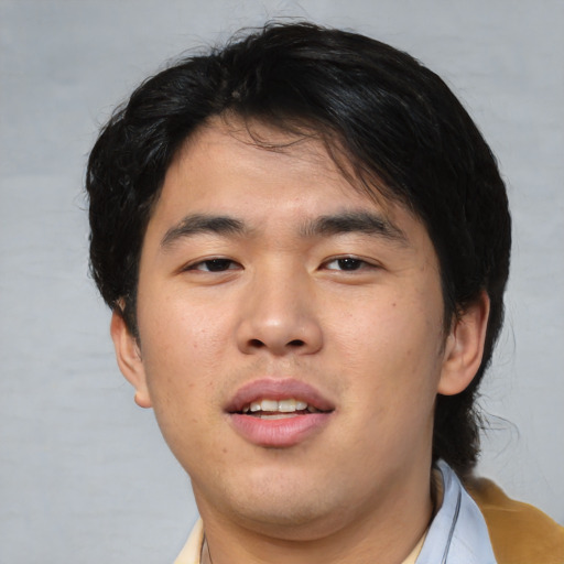 Neutral asian young-adult male with short  brown hair and brown eyes