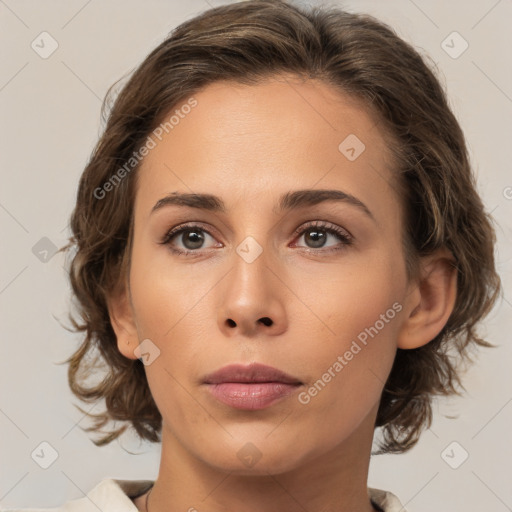 Neutral white young-adult female with medium  brown hair and brown eyes